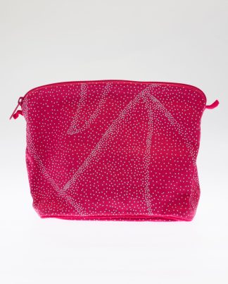 Large pink cotton lined wash bag with turquoise dot design.