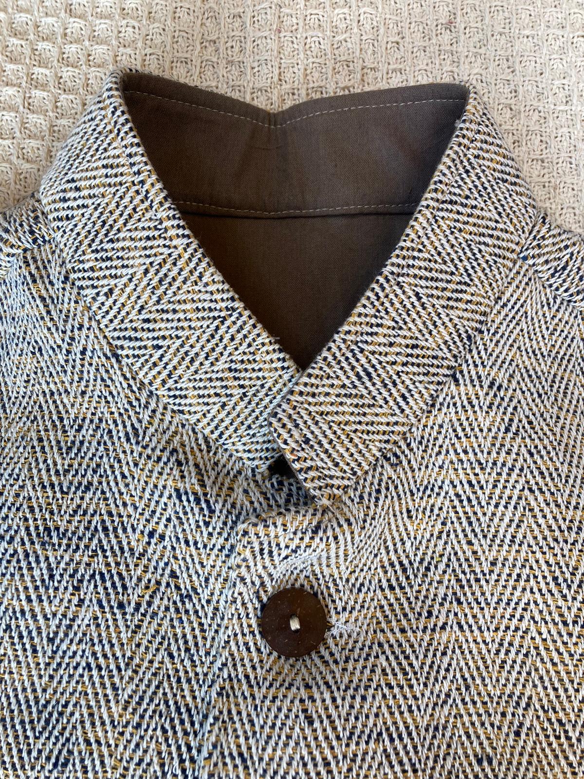 The collar of a beautiful hand woven waistcoat from Malabar Tradings Ethical Clothing For Men range