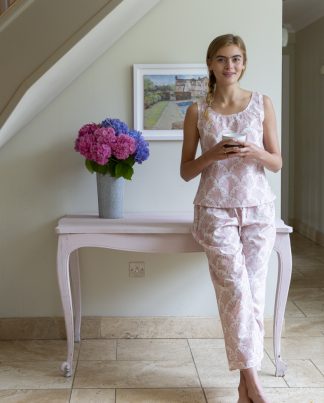 100% cotton vest style pyjamas. Blockprint design in pink on white.